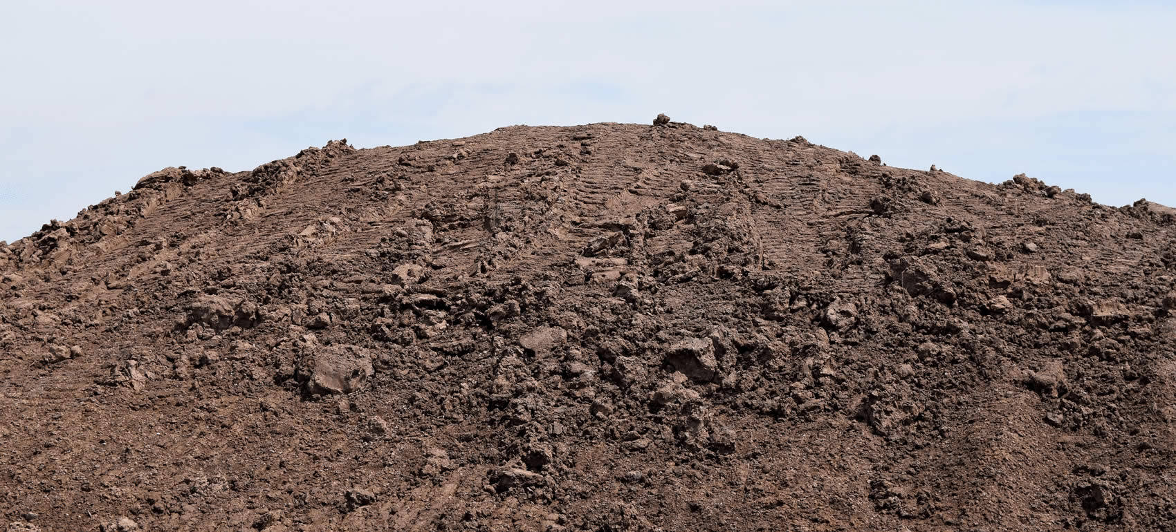 Construction site with excavators and fill dirt - Clean Fill Network marketplace